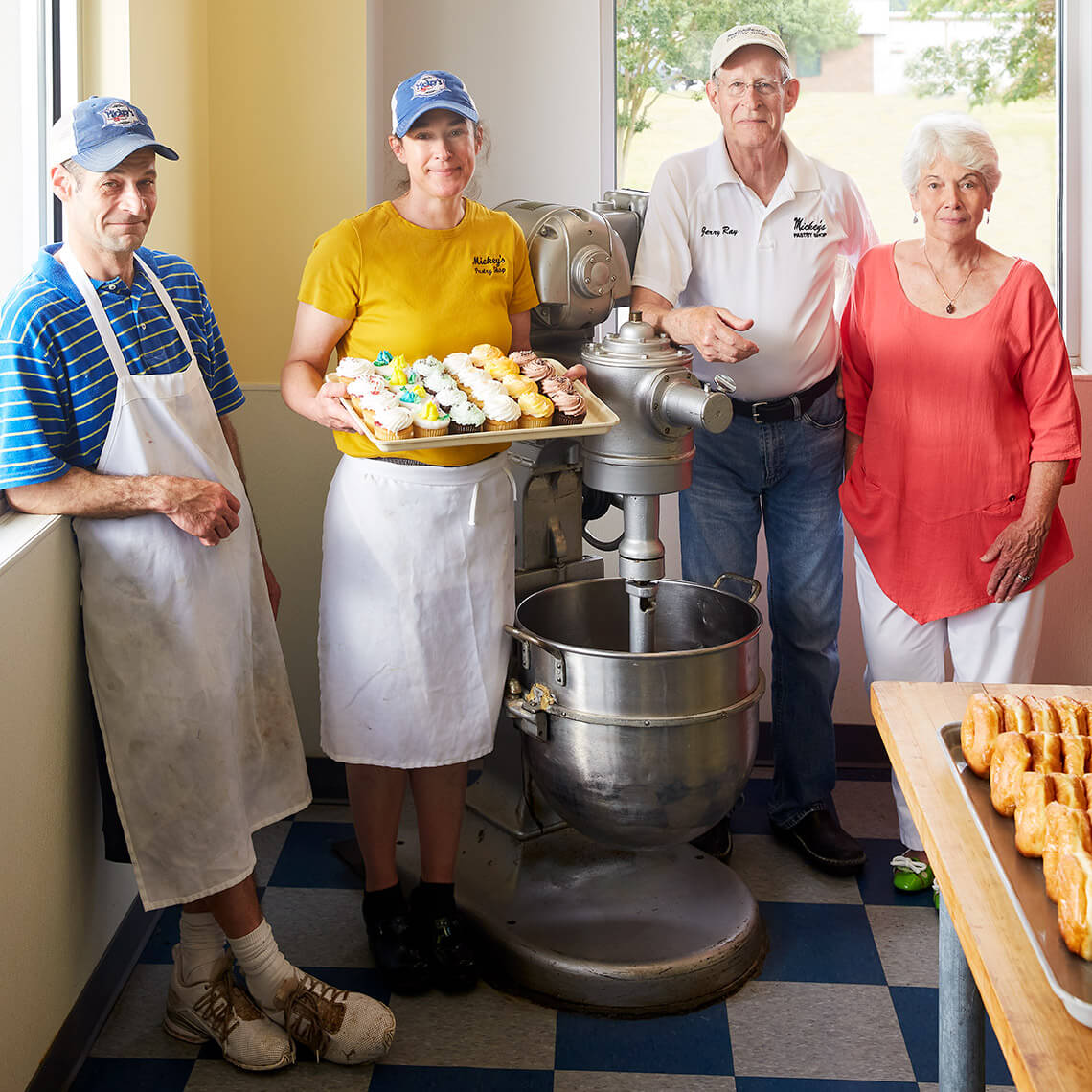 Jerald, Melanie, Jerry, and Carole Daniels in the Mickey's Pastry Shop kitchen